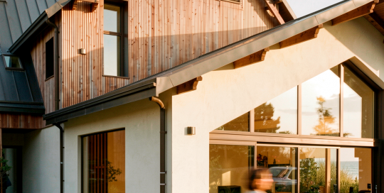 Maison ossature bois La Baule — perspective de la villa de 300 m², socle minéral et bardage bois